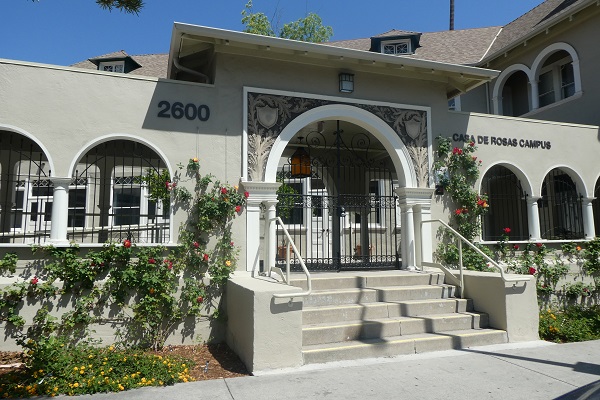 Restored front view of Casa de Rosas campus entrance